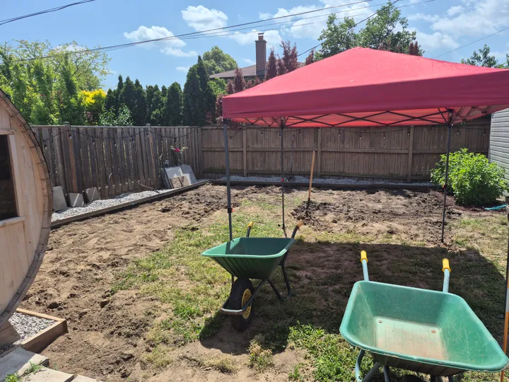 Excavation underway in the backyard for the new interlock layout.