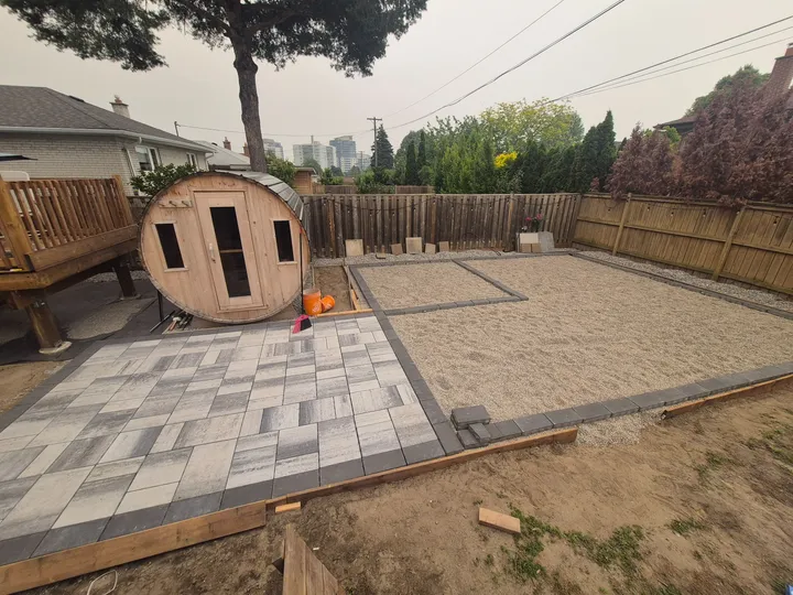 The first paved areas and contrasting borders taking shape on the prepared base.